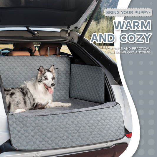 Lovely dog sitting on quilted pet car boot protector – warm and cozy grey design