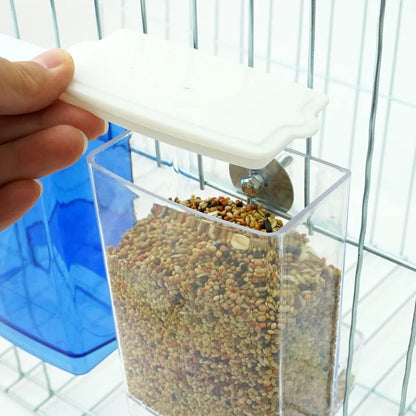 Clear and blue automatic bird feeders with transparent seed compartments